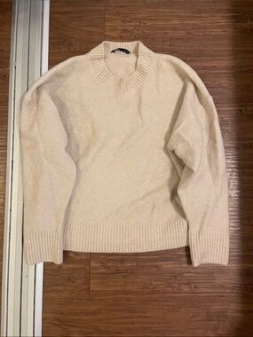 Cream sweater